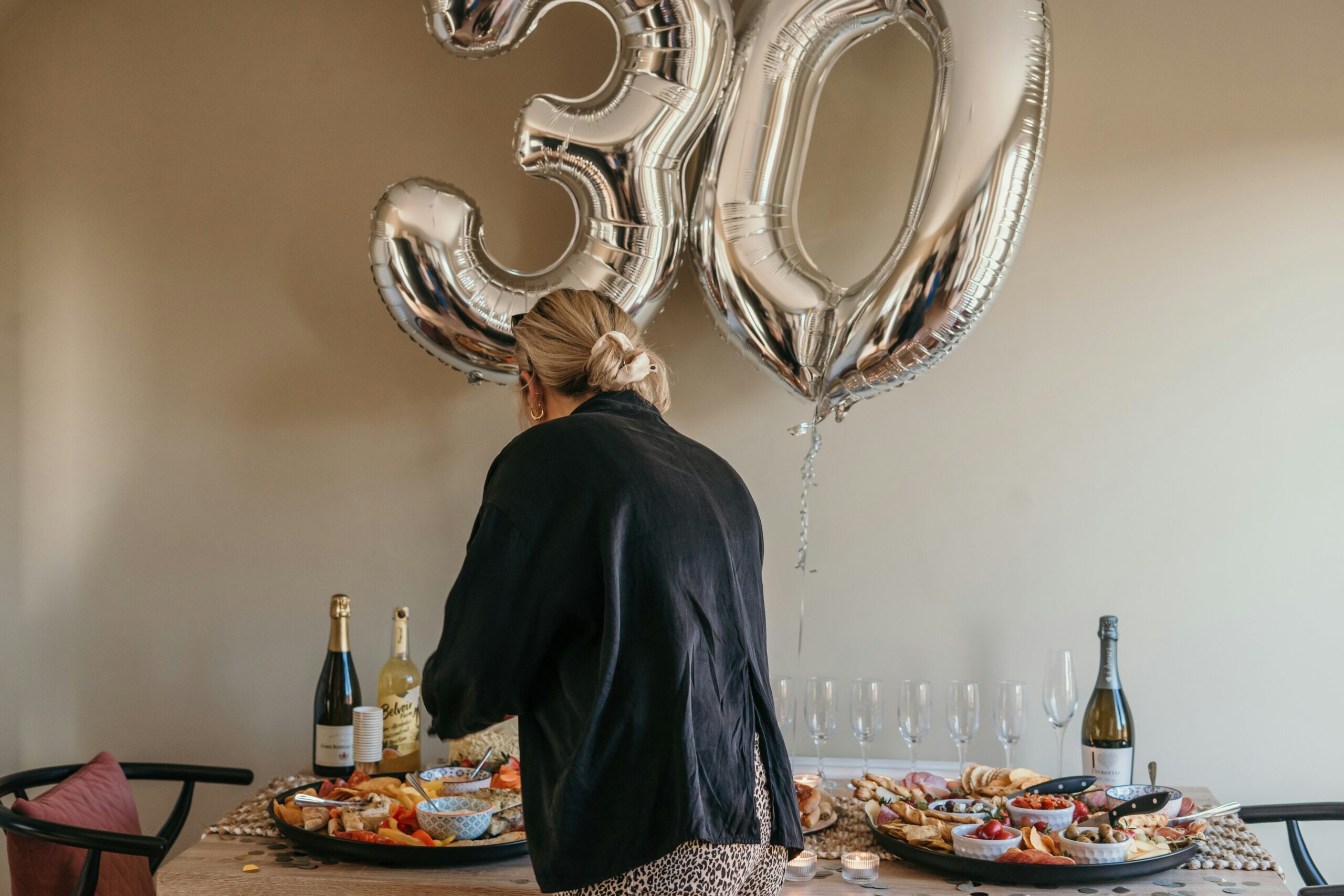 Jane celebrating her $200 credit card price protection refund