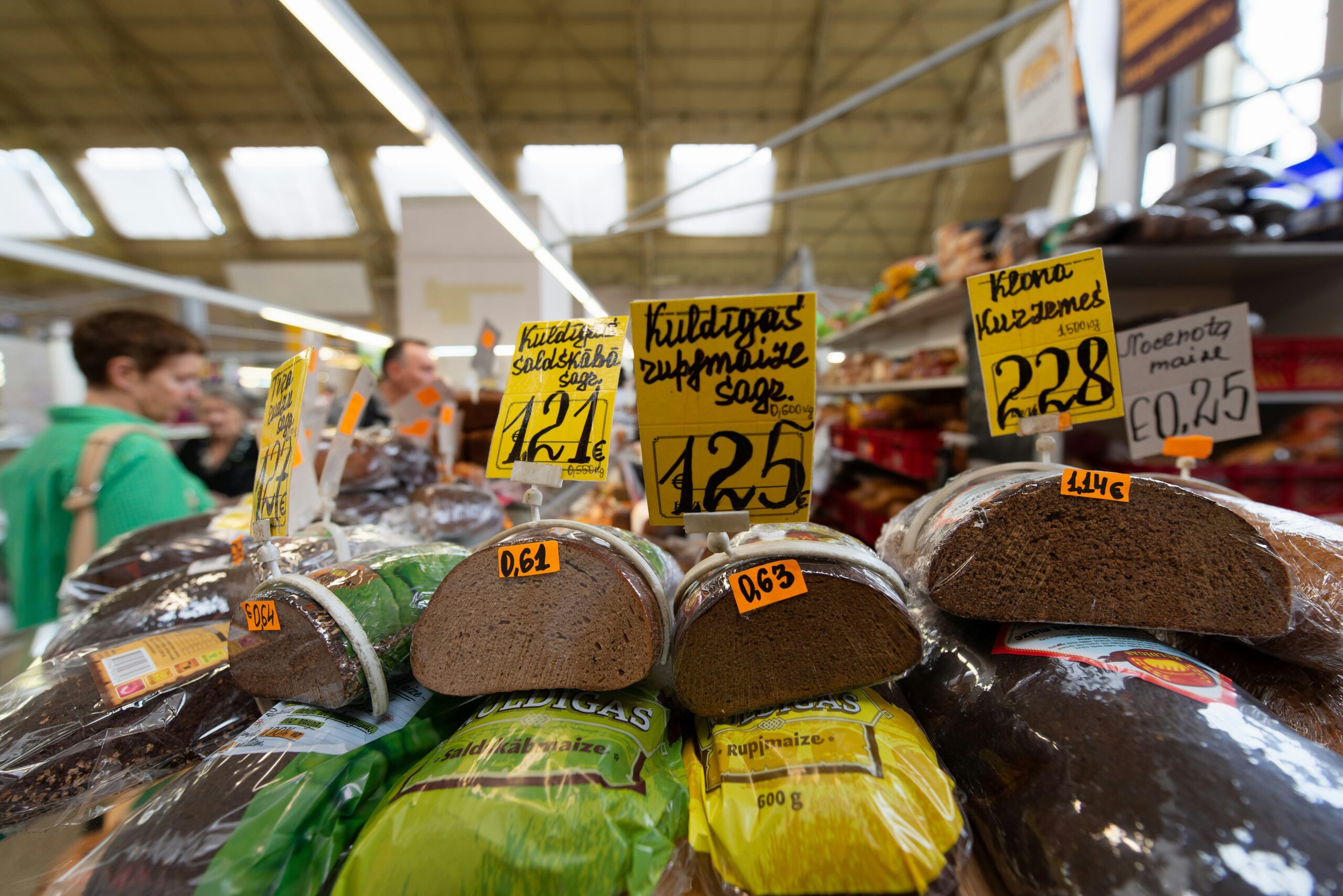Person reviewing receipts at a desk