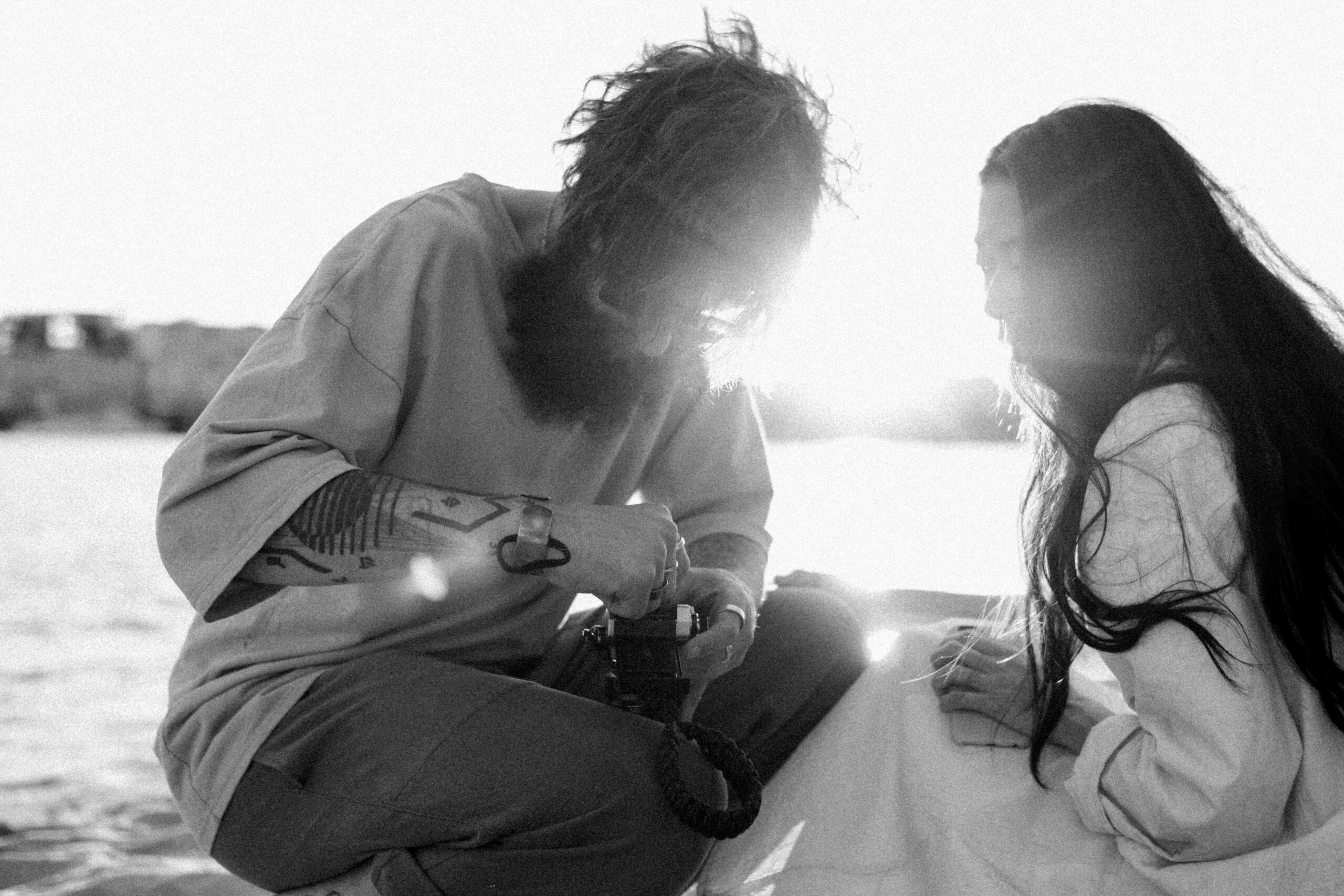 Photo of Sarah holding her Dyson vacuum with a caption overlay reading ‘$150 saved using price protection’